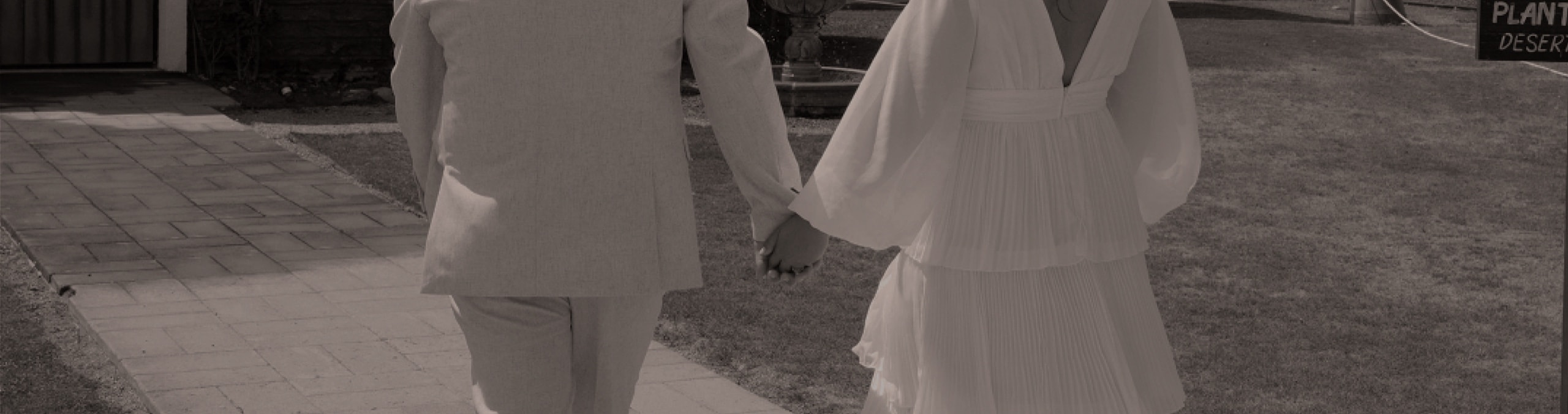 Angie and Nick walking hand in hand